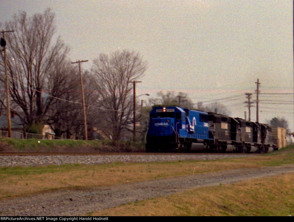 CR 6849 leads a train southbound
